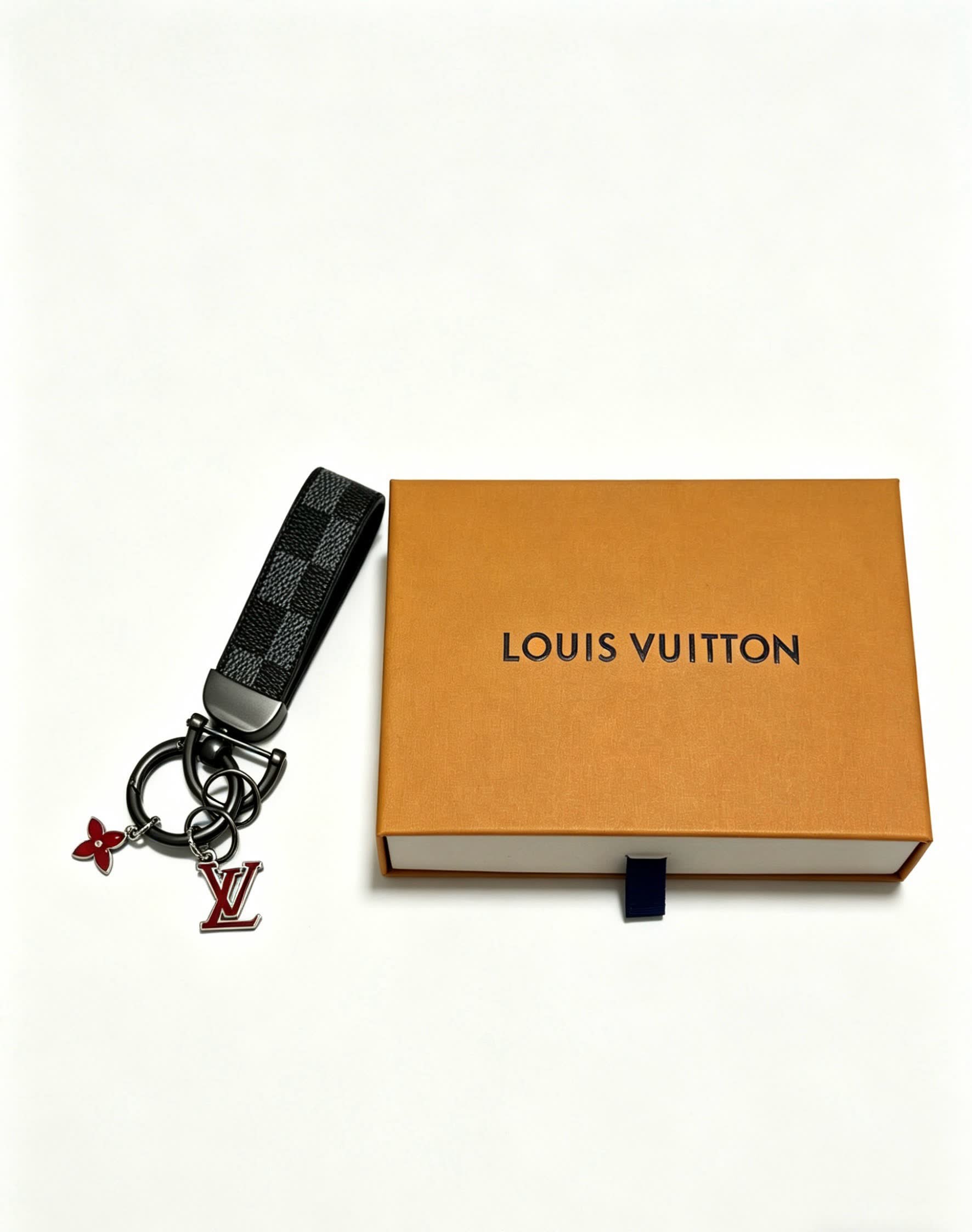 Louis Vuitton Keychain with Monogram Pattern and Logo Charm Louis Vuitton Keychain with Monogram Pattern and Logo Charm